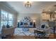 Spacious living room boasting hardwood floors and an open-concept design with kitchen views at 447 Beacon Nw St, Concord, NC 28027