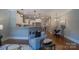 Inviting living room showcasing hardwood floors and seamless access to a modern kitchen and dining area at 447 Beacon Nw St, Concord, NC 28027