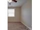 Bedroom with neutral walls, ceiling fan, and a window at 5017 Willing Ct # 124, Fort Mill, SC 29707