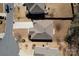 Aerial view of the home showcasing its roofline, driveway, and surrounding landscape at 5017 Willing Ct # 124, Indian Land, SC 29707
