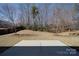 Open backyard with a concrete patio, offering a serene outdoor space at 5017 Willing Ct # 124, Indian Land, SC 29707