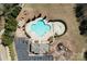 Aerial view of community pool, playground, and parking, for summer fun and convenience at 5017 Willing Ct # 124, Indian Land, SC 29707