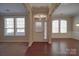 Bright foyer with a view of the hardwood floors, windows, and fresh, neutral paint at 5017 Willing Ct # 124, Indian Land, SC 29707