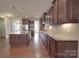 Well-equipped kitchen with granite countertops, stainless steel appliances, and generous cabinet space at 5017 Willing Ct # 124, Indian Land, SC 29707