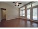Living room has large windows allowing natural light; door provides easy access to outdoor spaces at 5017 Willing Ct # 124, Indian Land, SC 29707