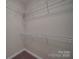 Walk-in closet with carpet and white wire shelving at 5017 Willing Ct # 124, Indian Land, SC 29707