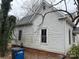 Side view of the one-story home showing the exterior wall and foundation at 517 Western Ave, Statesville, NC 28677