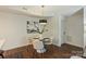 Dining area featuring modern table setting, minimalist decor, and plenty of natural light at 718 W Trade St # 307, Charlotte, NC 28202