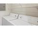 Convenient laundry area featuring a white washer and dryer at 718 W Trade St # 307, Charlotte, NC 28202