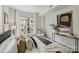 Inviting main bedroom featuring city views and a calming interior design at 718 W Trade St # 307, Charlotte, NC 28202