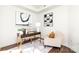 Modern office with a work desk and seating, illuminated by natural light at 718 W Trade St # 307, Charlotte, NC 28202
