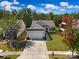 Charming single-story home with a two-car garage, manicured lawn, and mature trees at 8107 Crater Lake Dr, Indian Land, SC 29707