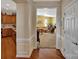 Open foyer showcasing hardwood floors that lead to a bright living room and modern kitchen at 8107 Crater Lake Dr, Indian Land, SC 29707