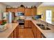 Modern kitchen featuring stainless steel appliances, granite countertops, and ample cabinet storage at 8107 Crater Lake Dr, Indian Land, SC 29707
