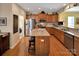 Well-appointed kitchen featuring stainless steel appliances, a center island, and ample cabinet space at 8107 Crater Lake Dr, Indian Land, SC 29707