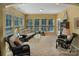 Bright and airy living area with lots of natural light and comfortable seating arrangement at 8107 Crater Lake Dr, Indian Land, SC 29707