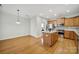 Spacious kitchen featuring wooden cabinets, stainless appliances, and center island at 8107 Crater Lake Dr, Indian Land, SC 29707