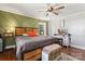 Inviting bedroom with hardwood floors, ceiling fan and unique bed frame at 851 Gist Rd, Rock Hill, SC 29732