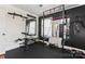 Home gym with weightlifting equipment, mirrors, and rubber flooring for a complete workout space at 851 Gist Rd, Rock Hill, SC 29732
