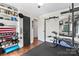 Bright home gym setup with natural light, fitness equipment, and free weights for convenient workouts at 851 Gist Rd, Rock Hill, SC 29732