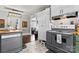Bright kitchen with stainless appliances, green cabinets, and access to a dining area at 851 Gist Rd, Rock Hill, SC 29732