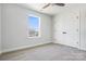 Bedroom featuring neutral walls, plush carpeting, and a double door closet at 1044 Margrace Rd, Kings Mountain, NC 28086