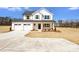 Charming two-story home featuring a two-car garage and manicured landscaping at 1044 Margrace Rd, Kings Mountain, NC 28086