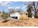 Exterior view showcasing a charming home with a new porch and landscaping at 108 Arlene Ave, Kannapolis, NC 28081