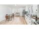 Open-concept kitchen/dining area features stainless appliances and stylish countertops at 108 Arlene Ave, Kannapolis, NC 28081