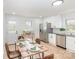 Beautiful eat-in kitchen features stainless steel appliances, stylish countertops, and hardwood floors at 108 Arlene Ave, Kannapolis, NC 28081