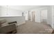 Cozy bonus room features neutral carpeting, a reading nook, and a serene ambiance at 11207 Argosy Dr, Lancaster, SC 29707