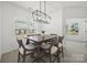 Stylish dining area with a modern chandelier and natural light, perfect for Gathering meals at 11207 Argosy Dr, Lancaster, SC 29707
