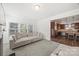 Bright living room showcasing an open floor plan that leads to a modern kitchen at 11207 Argosy Dr, Lancaster, SC 29707