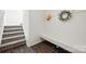 A well-organized mudroom features a built-in bench and coat hooks, offering practical storage solutions at 11207 Argosy Dr, Lancaster, SC 29707