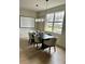 Dining room features modern lighting, a large window, and stylish decor creating an inviting atmosphere at 121 Irving Ave, Mooresville, NC 28117