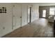 Spacious open-concept living room features new flooring and neutral decor for a bright living space at 121 Irving Ave, Mooresville, NC 28117