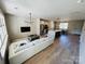 Open-concept layout seamlessly connects the kitchen, living, and dining areas for contemporary living at 121 Irving Ave, Mooresville, NC 28117