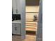 Walk-in pantry with custom shelving, perfect for storing groceries and kitchen essentials at 121 Irving Ave, Mooresville, NC 28117