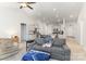 Open-concept living room blending seamlessly into the kitchen, creating a bright and inviting space for entertaining at 156 Sugar Hill Rd, Troutman, NC 28166