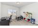 Bright home office with a large window and a lot of space for storage and working at 156 Sugar Hill Rd, Troutman, NC 28166