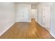Spacious bedroom with hardwood floors, bright lighting, and plenty of closet space at 15604 Waterfront Dr, Huntersville, NC 28078