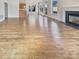 Spacious living room with fireplace, hardwood floors, and natural light at 15604 Waterfront Dr, Huntersville, NC 28078