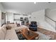 Open-concept living area featuring a seamless transition into the kitchen and dining space at 2116 Belterra Dr, Charlotte, NC 28216