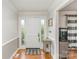 Inviting entryway with hardwood floors, decorative molding, and a front door with glass sidelights at 2156 Flynn Dr, Gastonia, NC 28054