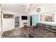 Modern living room includes tile floors, neutral colors, and a large window at 2156 Flynn Dr, Gastonia, NC 28054