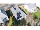 Aerial view of a home's roof with solar panels, providing an energy-efficient and modern living experience at 2316 Winding River Dr, Charlotte, NC 28214