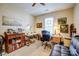 Bedroom featuring lots of decor, and a black office chair for remote work at 2316 Winding River Dr, Charlotte, NC 28214