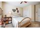 Bedroom with carpeted floors, decor and a wooden bed frame at 2316 Winding River Dr, Charlotte, NC 28214