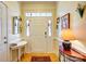 Bright foyer with hardwood floors, decorative glass, and stylish wall accents at 2316 Winding River Dr, Charlotte, NC 28214