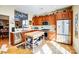 Kitchen featuring stainless appliances, wood cabinets, an island and lots of sunlight at 2316 Winding River Dr, Charlotte, NC 28214